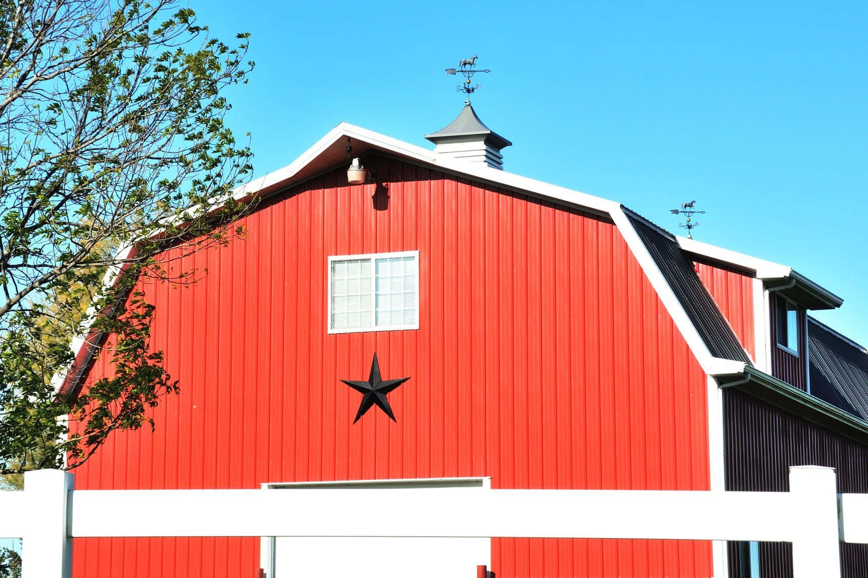 Capture the beauty of rural life with this rustic red barn