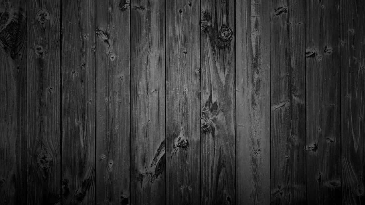 Black Wood Background With A Black Background Wallpaper