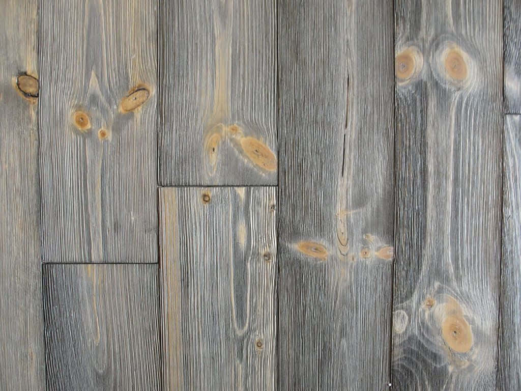A Close Up Of A Wooden Floor With Gray Paint Wallpaper