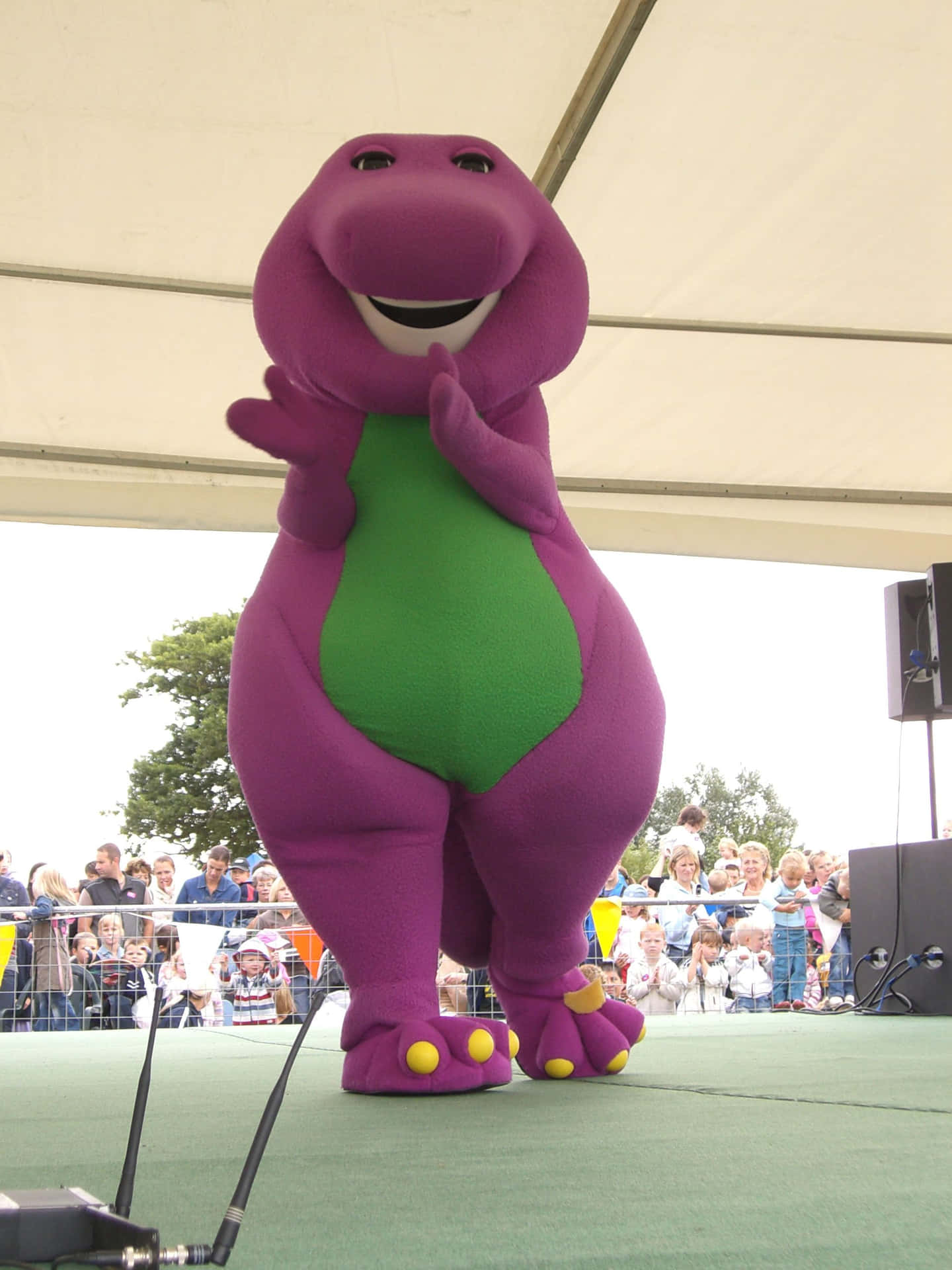 A Purple Dinosaur Mascot