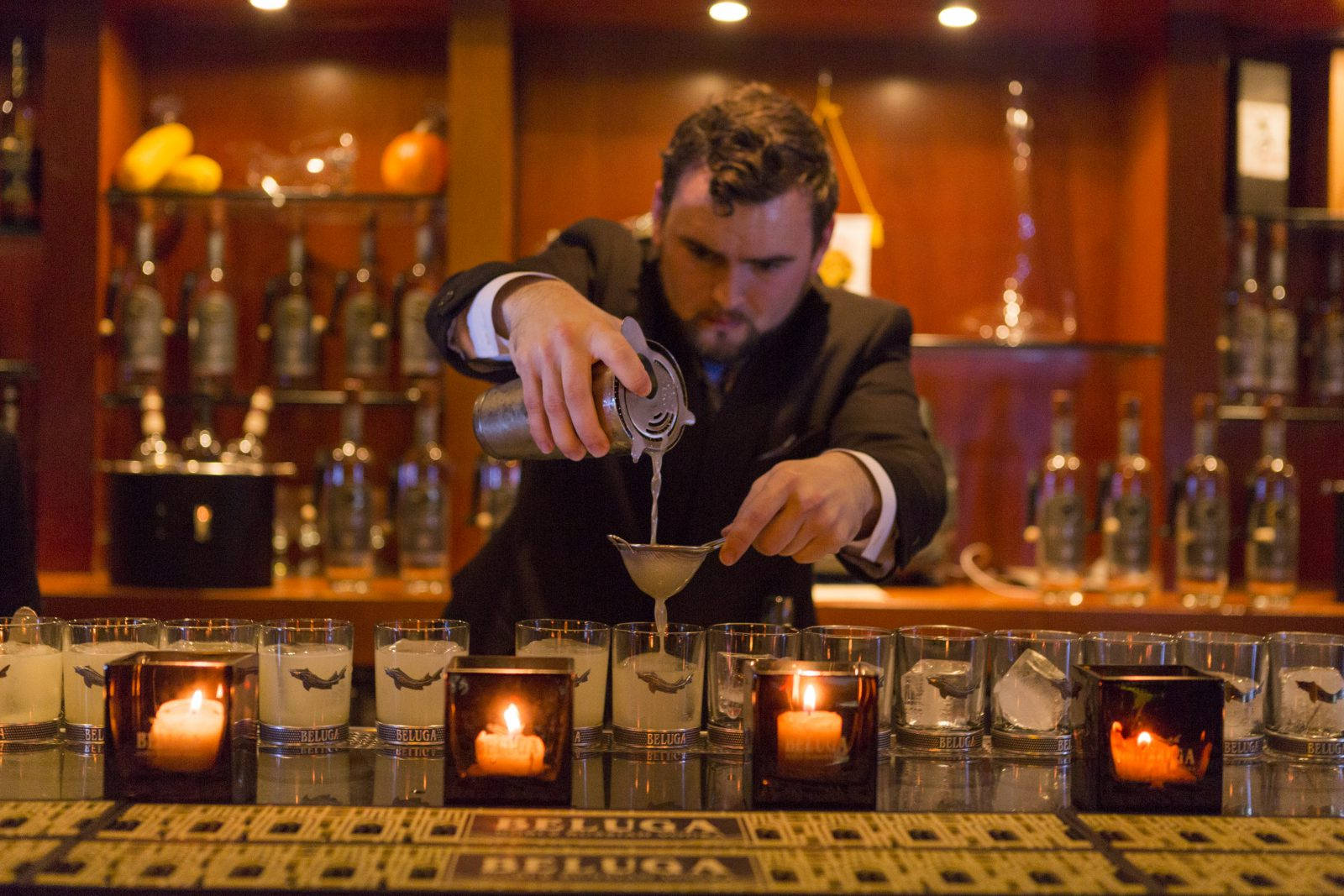 Bartender Mixing Beluga Vodka Drinks In Bar Picture