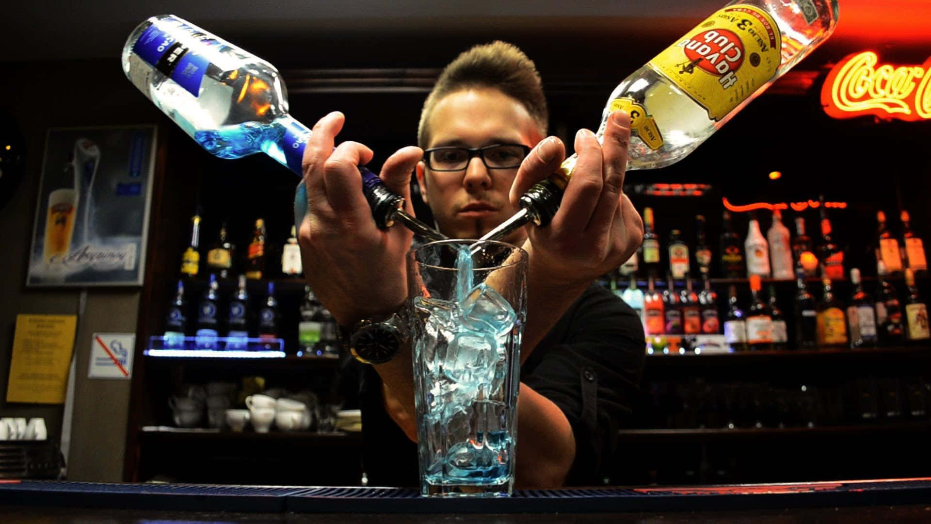 Bartender Performing Trick Pour Wallpaper