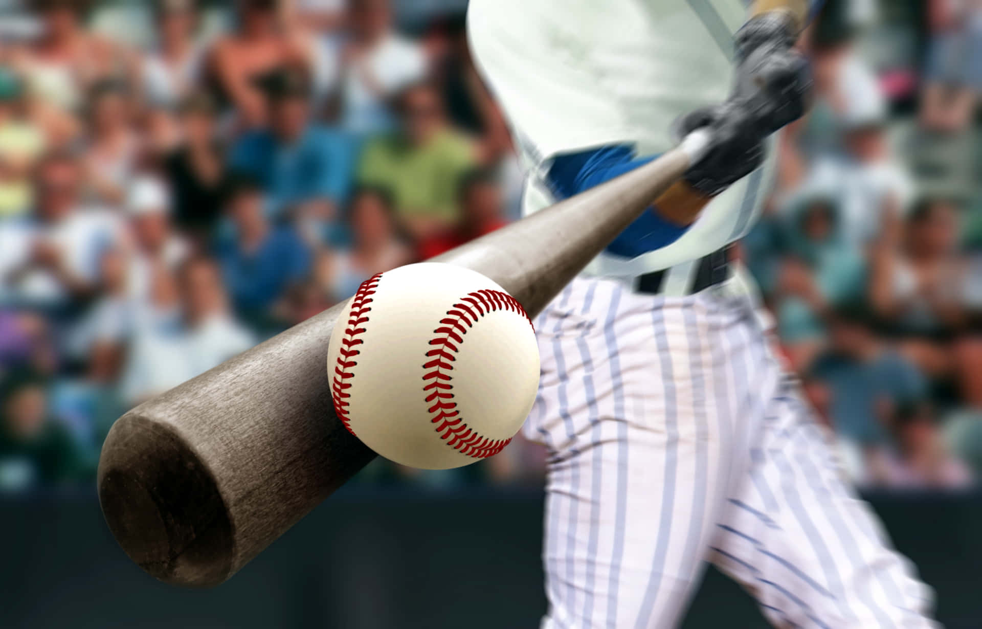 A Baseball Player Is Swinging A Bat
