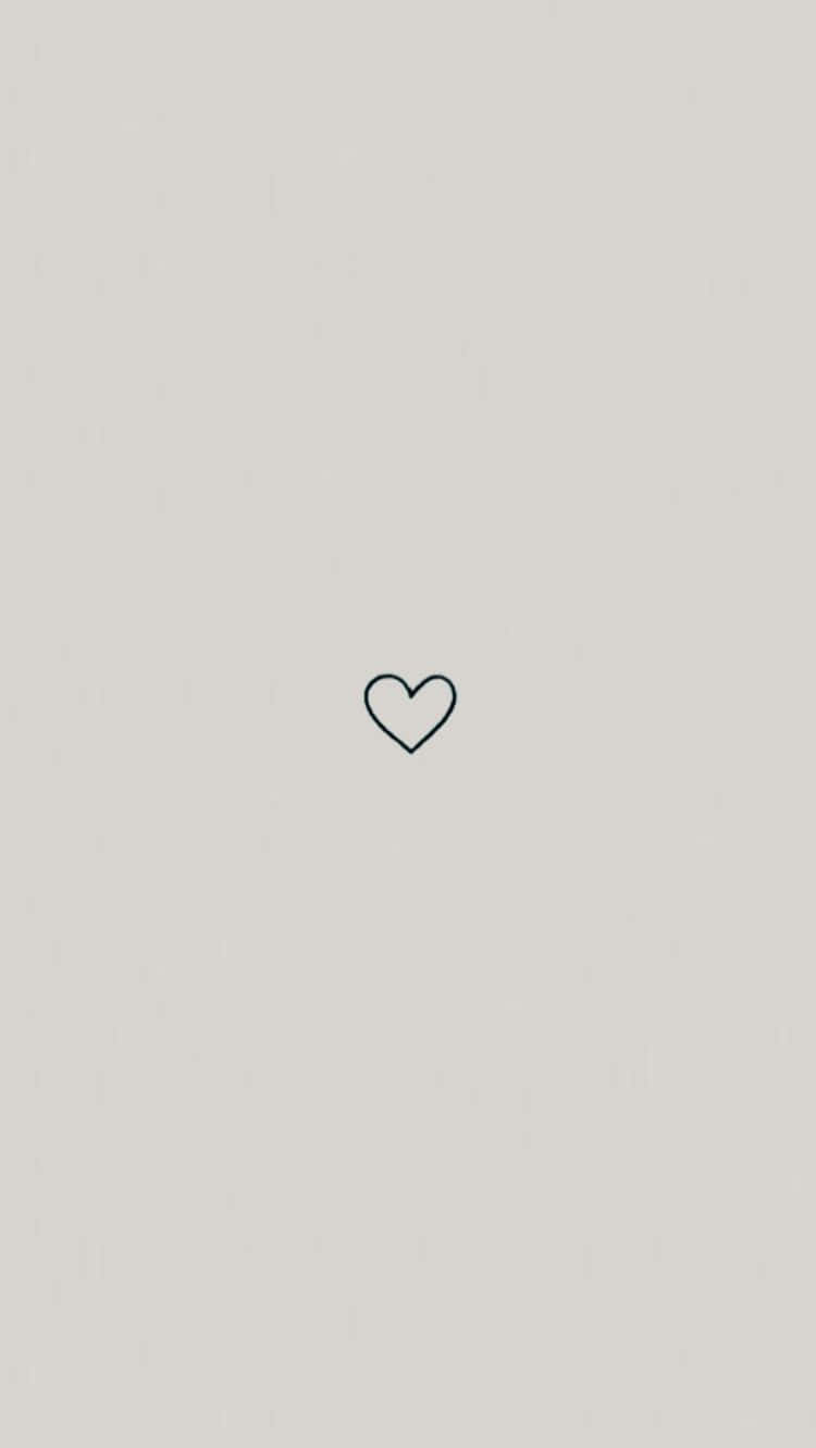 A Heart Shaped Icon On A Grey Background