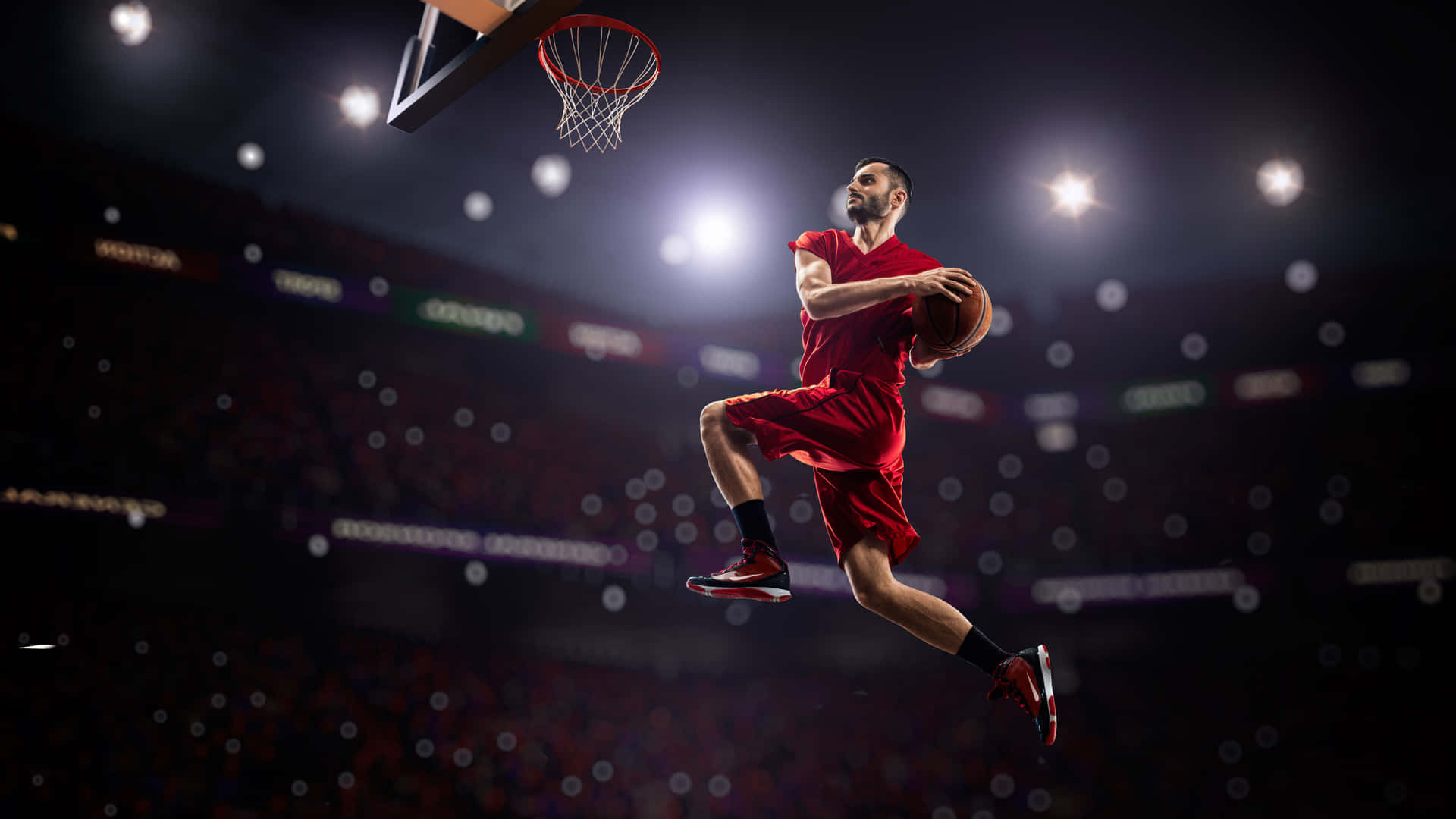 Basketballspielerspringt, Um Zu Schießen Hintergrund.