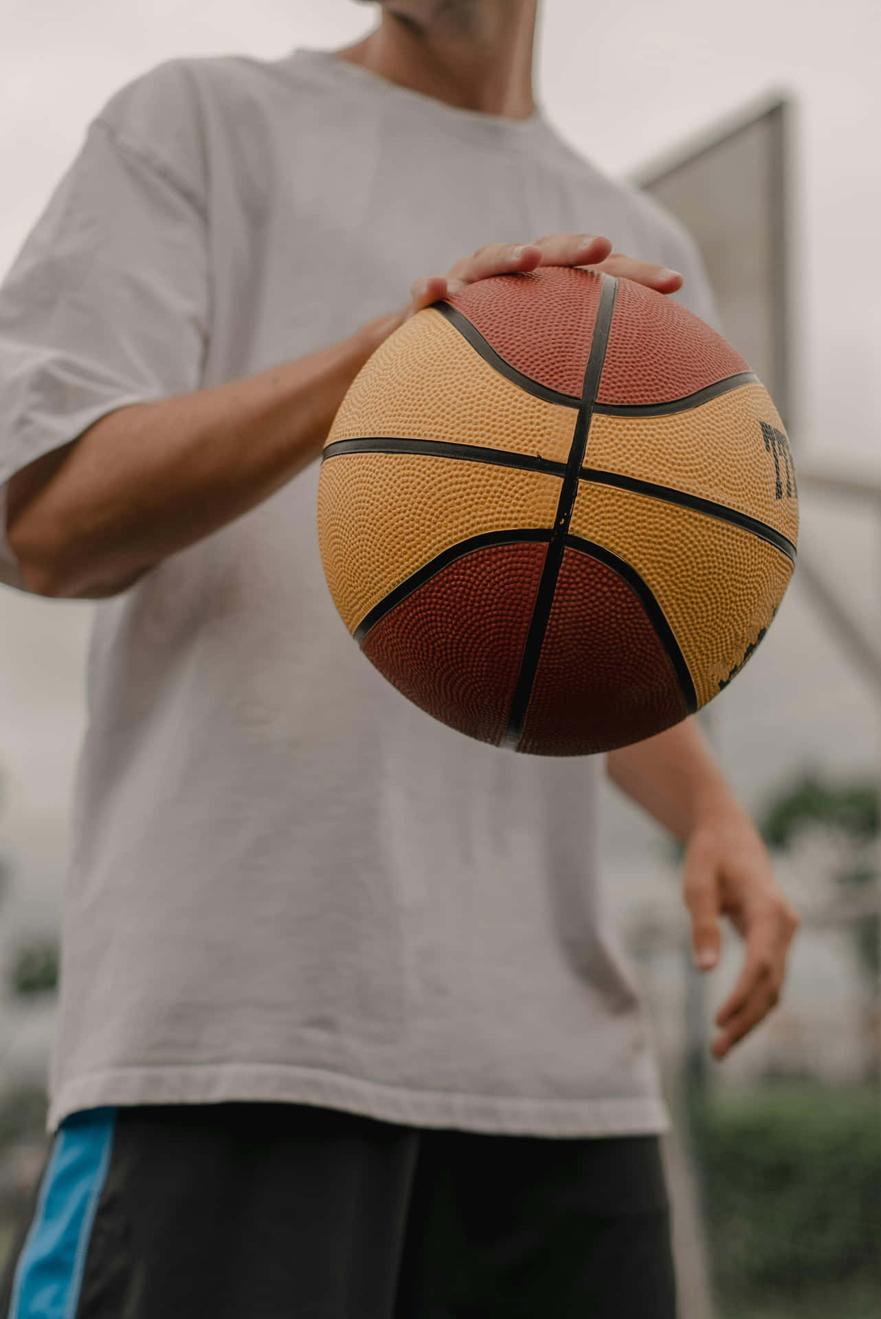 Basketball Player Holding Ball Court Wallpaper