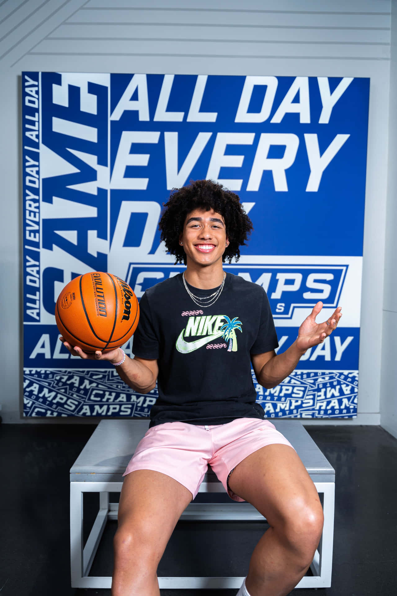 Basketball Player Posing With Ball Wallpaper