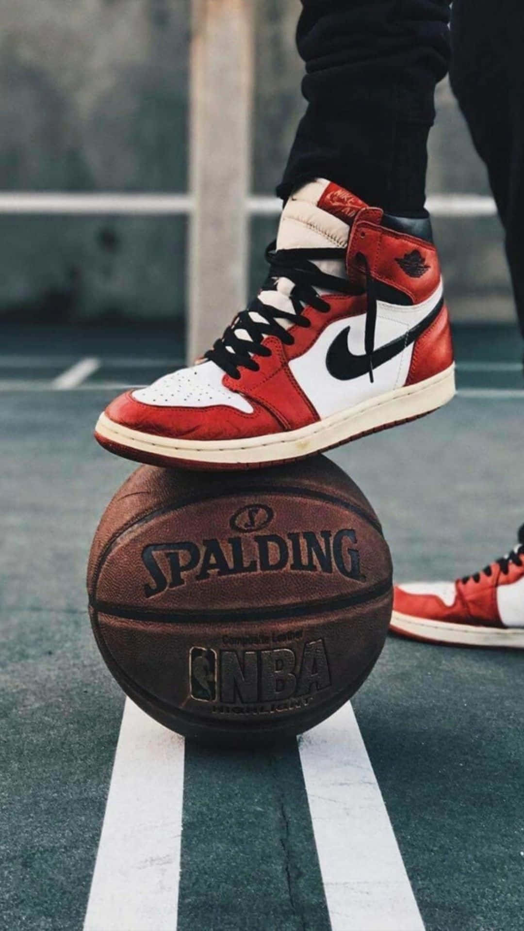 Basketball Shoe Balanceon Court Wallpaper