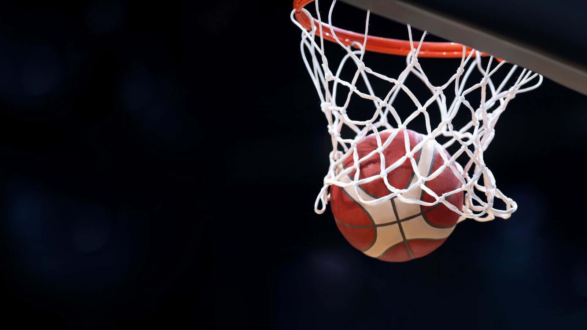 Basketball Swishing Through Net Wallpaper