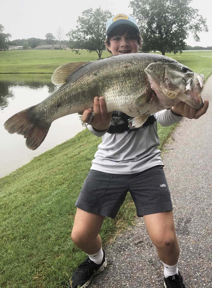 Man Carrying Fat Belly Bass Picture
