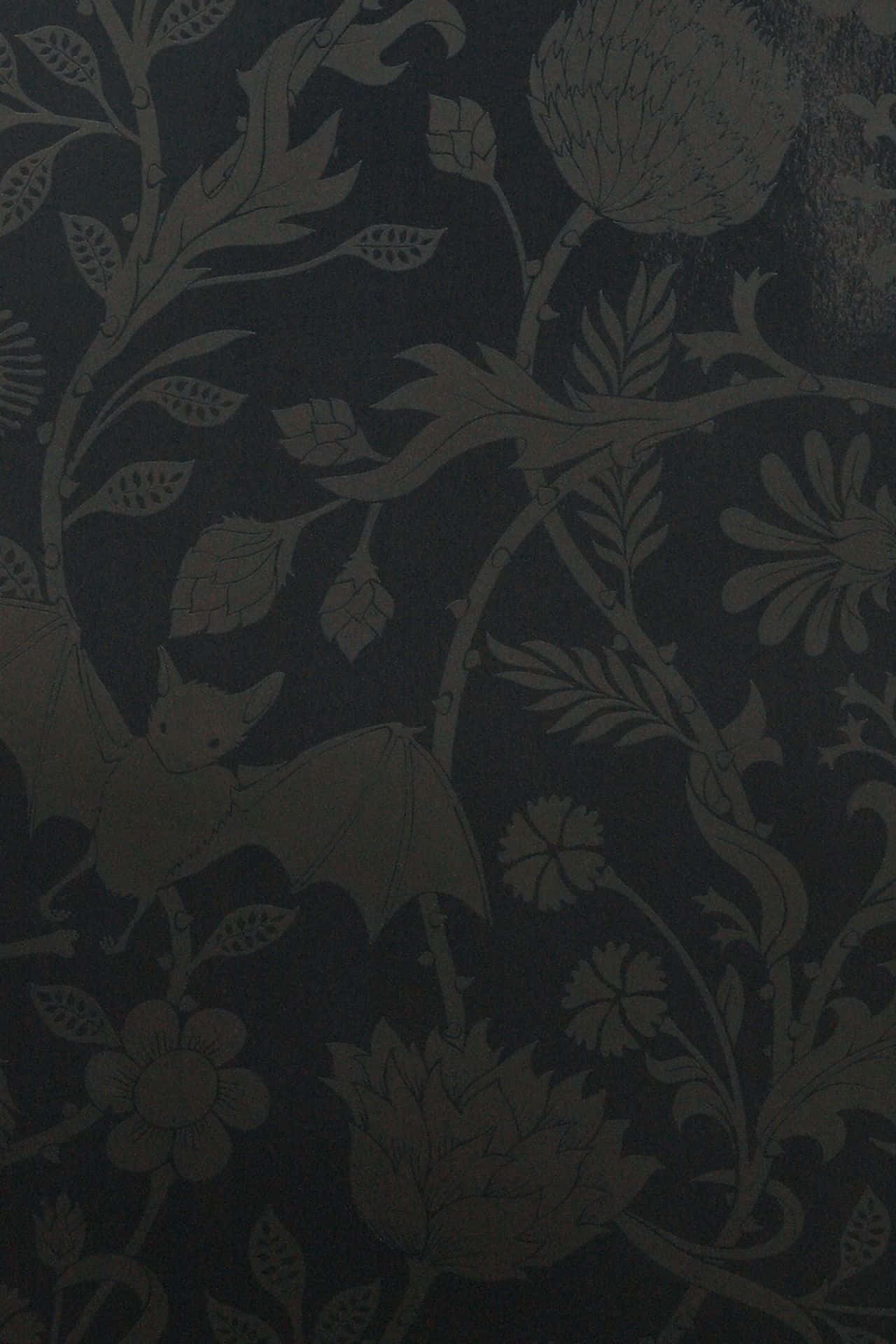 A Black Wallpaper With A Floral Pattern Wallpaper