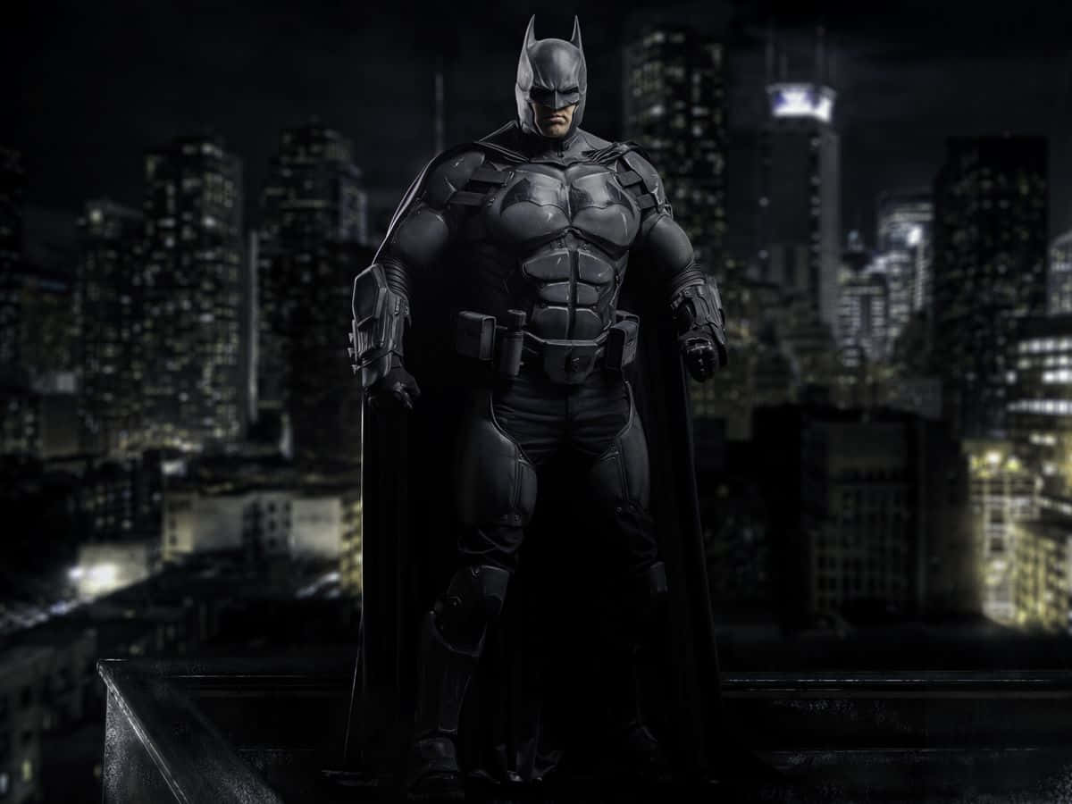 The Dark Knight ready for action in his iconic Bat-suit Wallpaper