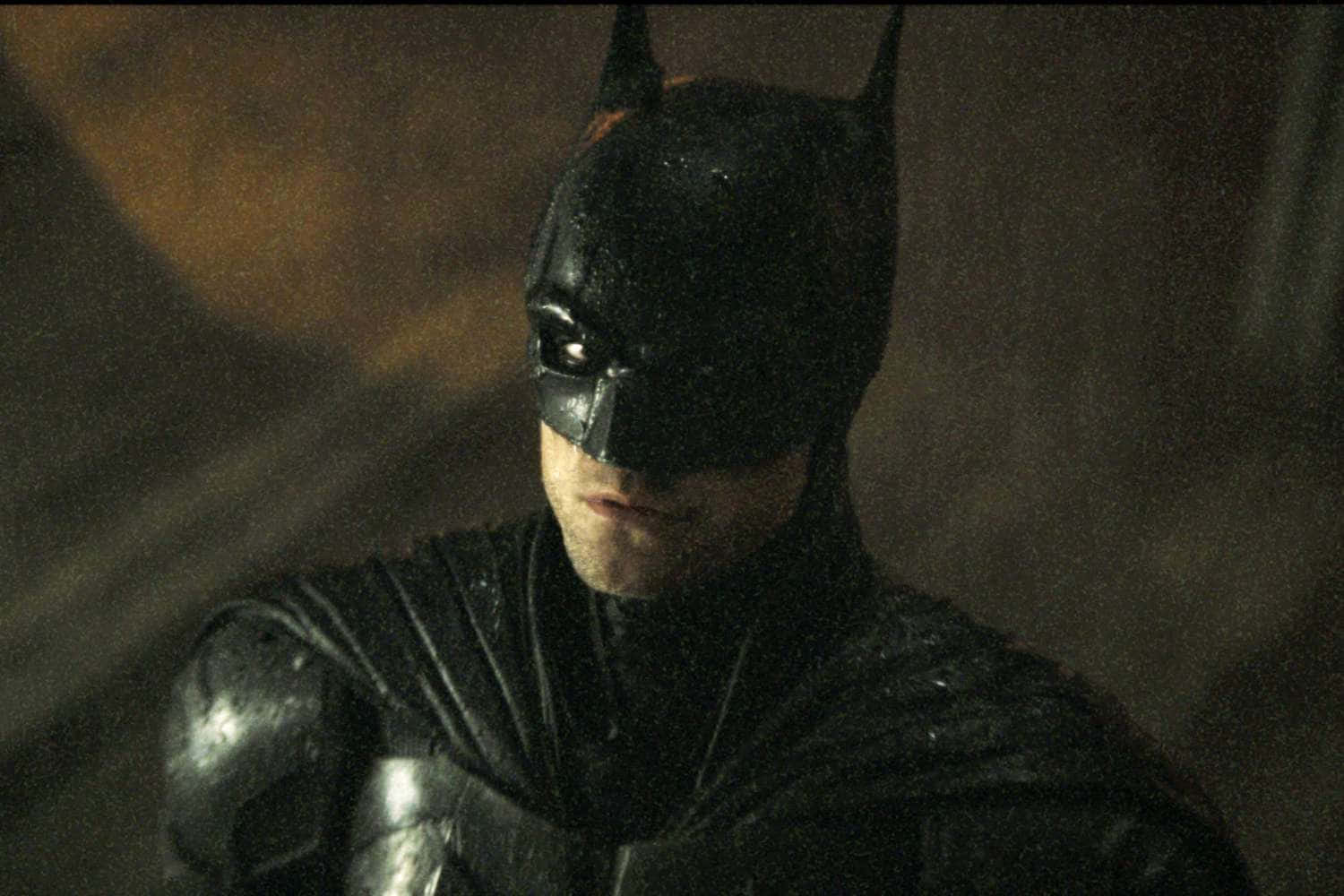 Elcaballero Oscuro: Impresionante Traje De Batman En Acción. Fondo de pantalla