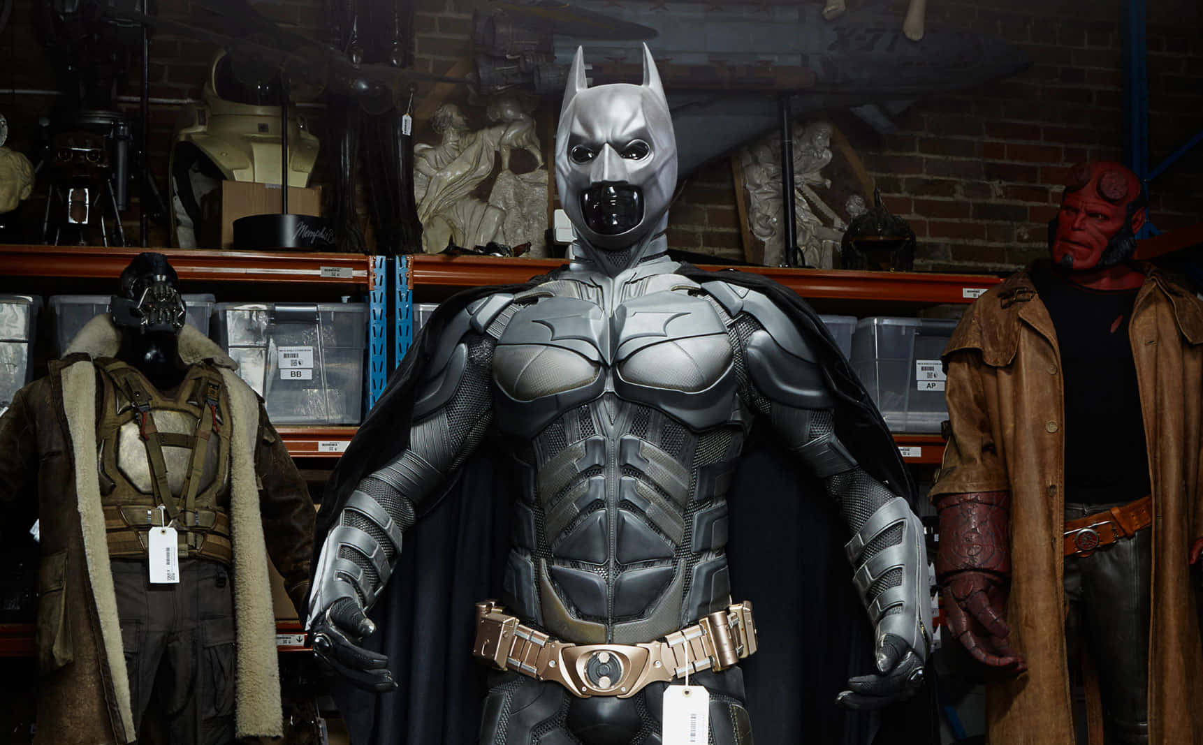 The Dark Knight Rises: An Iconic Bat-suit for a Legend Wallpaper