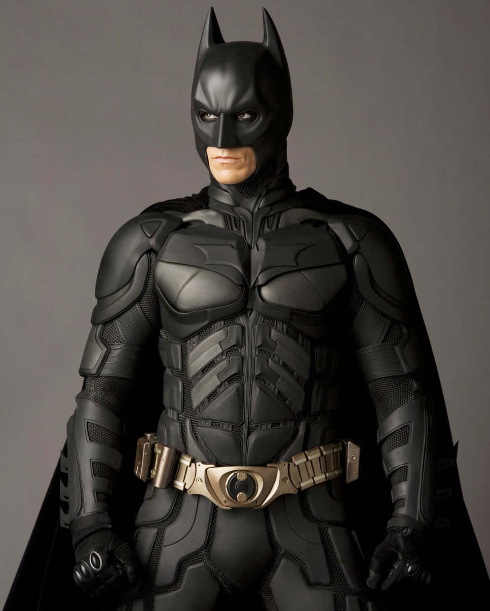 The Dark Knight's Iconic Bat-suit Wallpaper