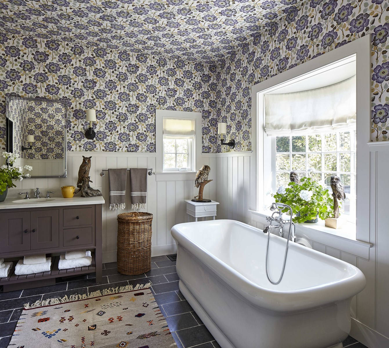 Elegant Lavender Bathtub Amidst Floral Beauty Wallpaper