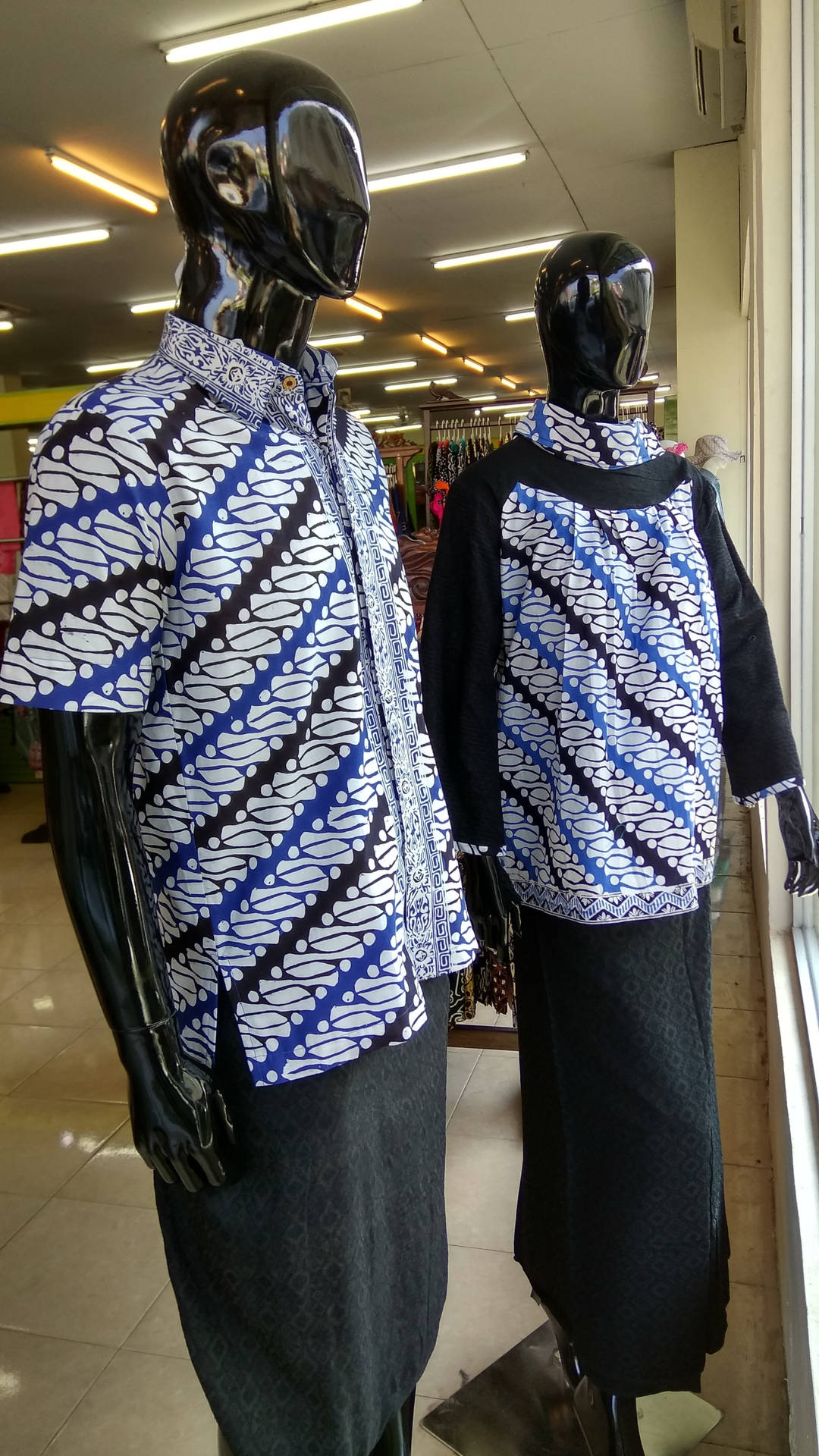 Batik Shirts On Mannequins Background