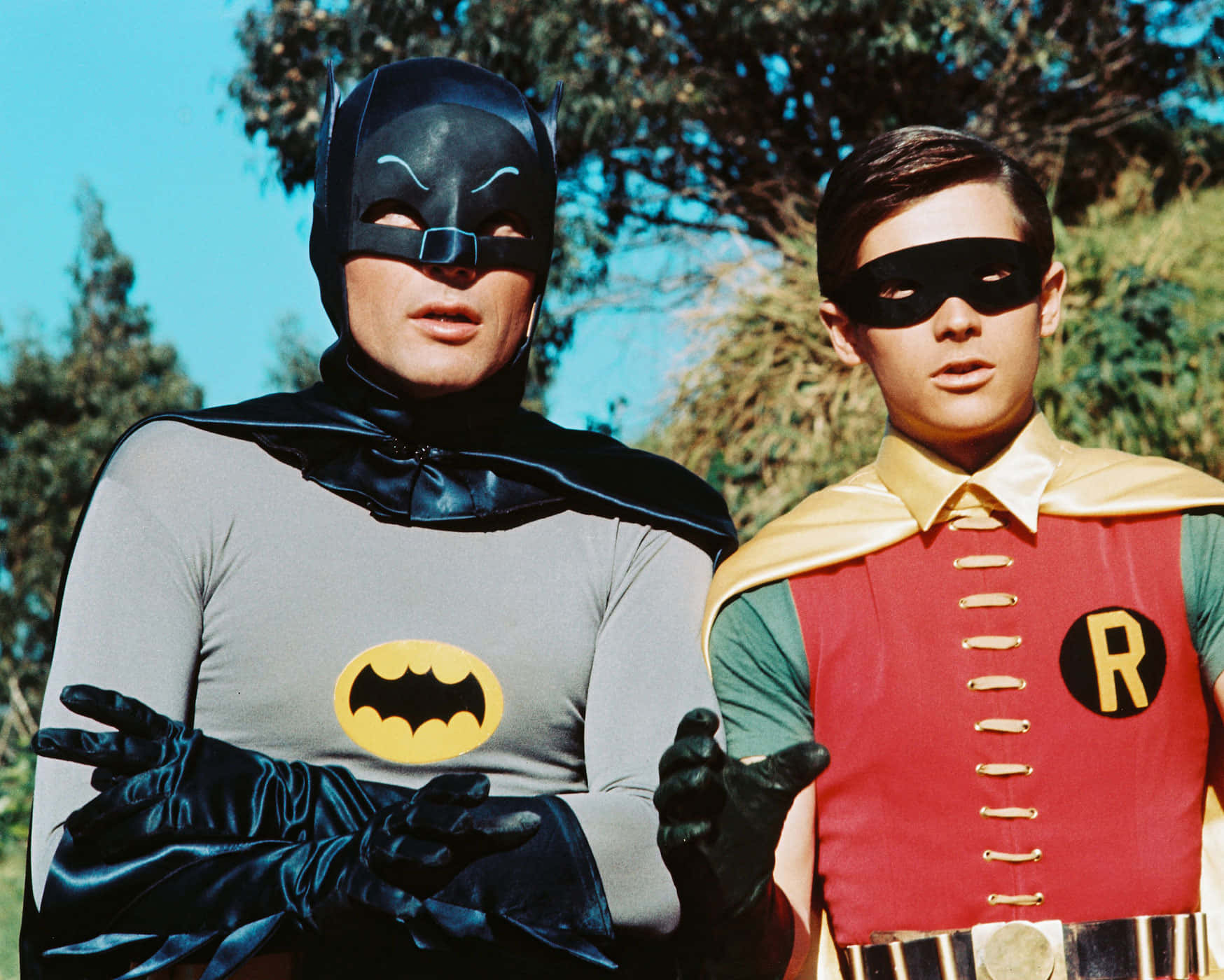 Batman and Robin standing tall in Gotham City Wallpaper