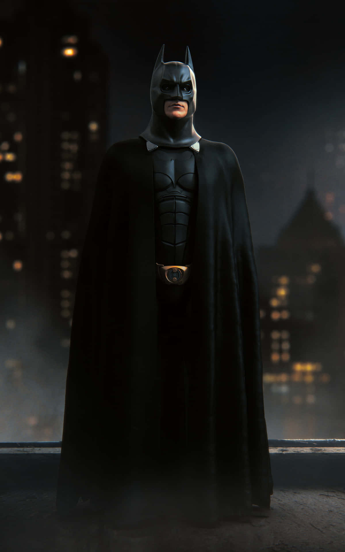 Batman standing tall amidst the darkness Wallpaper