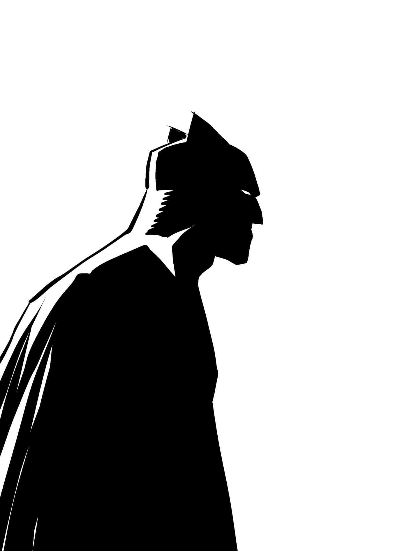 Batman standing tall in black and white Wallpaper