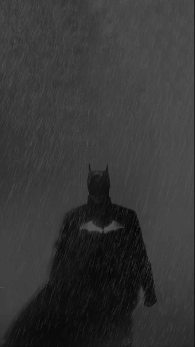 Batmanposando Heroicamente En Impresionante Blanco Y Negro Fondo de pantalla