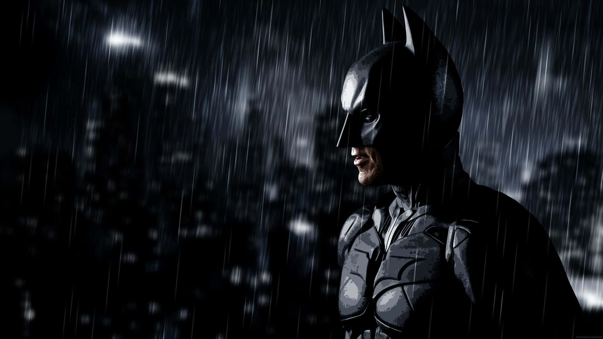 Batman står i regnen foran en by skyline. Wallpaper