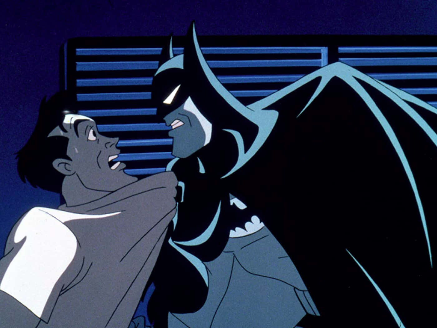 Batman and Phantasm facing each other in a battle scene in the movie Batman: Mask of the Phantasm Wallpaper