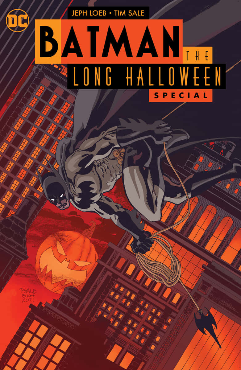 Batman standing tall in a haunting scene on Halloween night Wallpaper