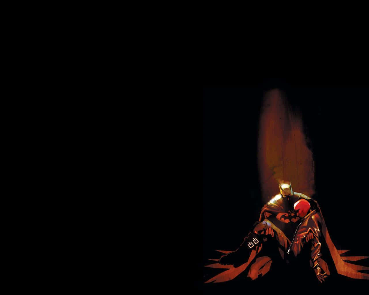 Batman and Red Hood Face Off in the Ultimate Showdown Wallpaper