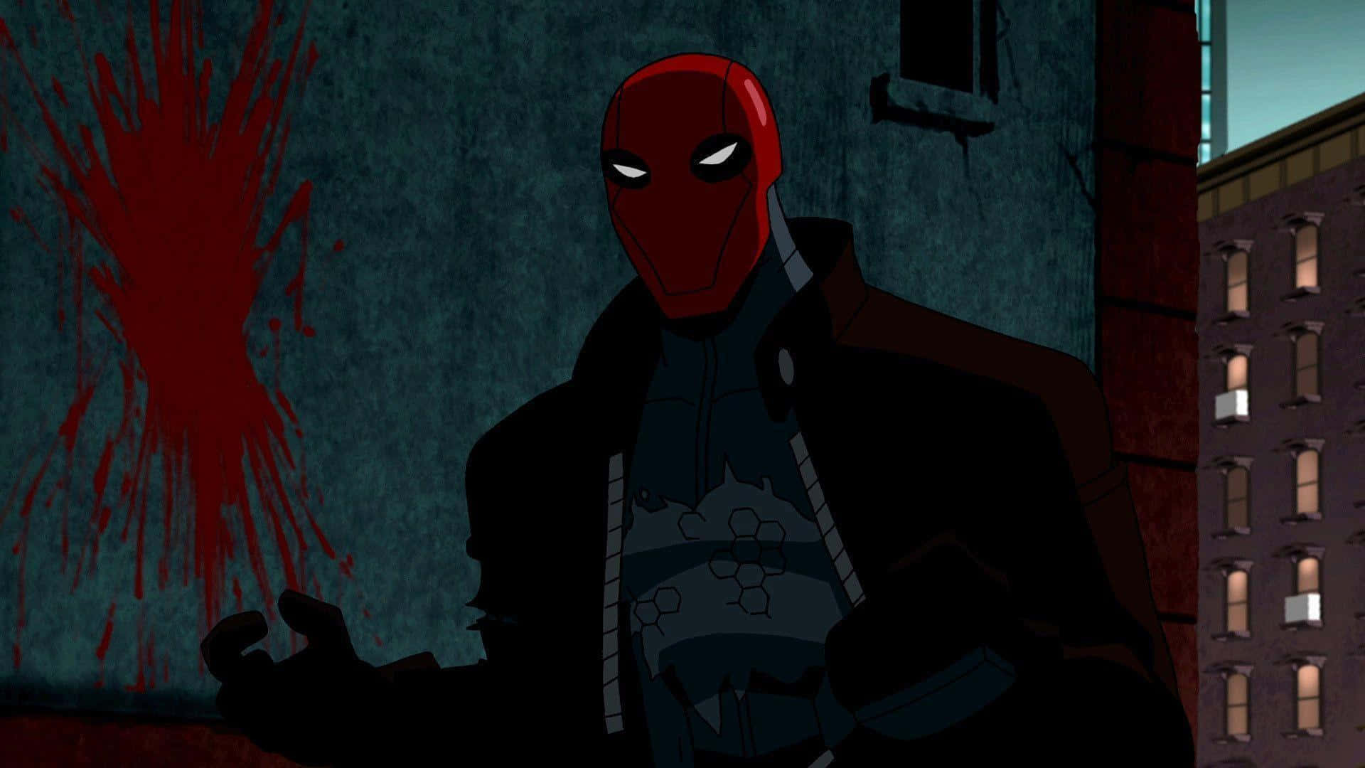 Batman and Red Hood Face Off in Epic Battle Wallpaper