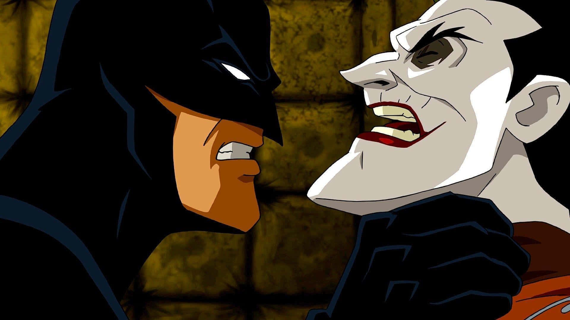 Batman confronting Red Hood - Intense Face-off Wallpaper