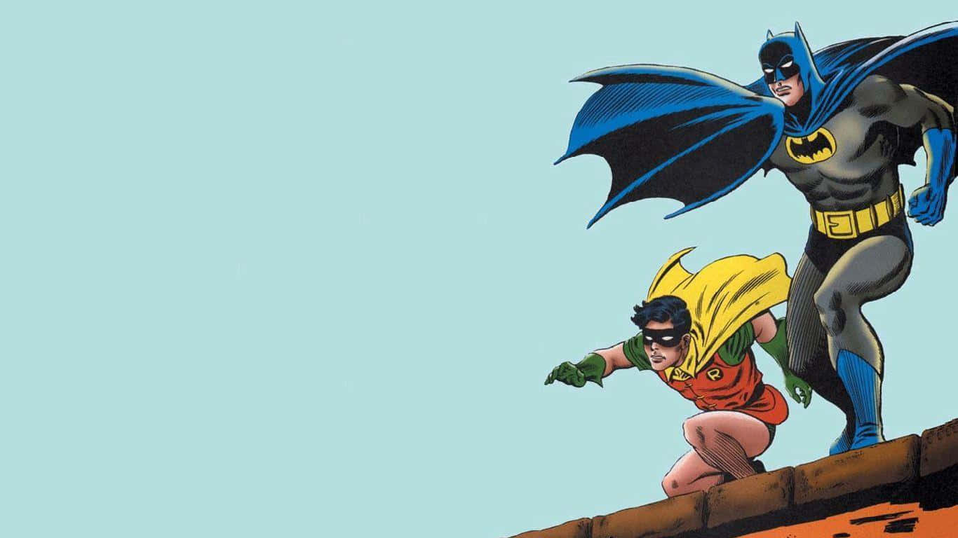 Batman and Robin Face-off in an Epic Battle Wallpaper