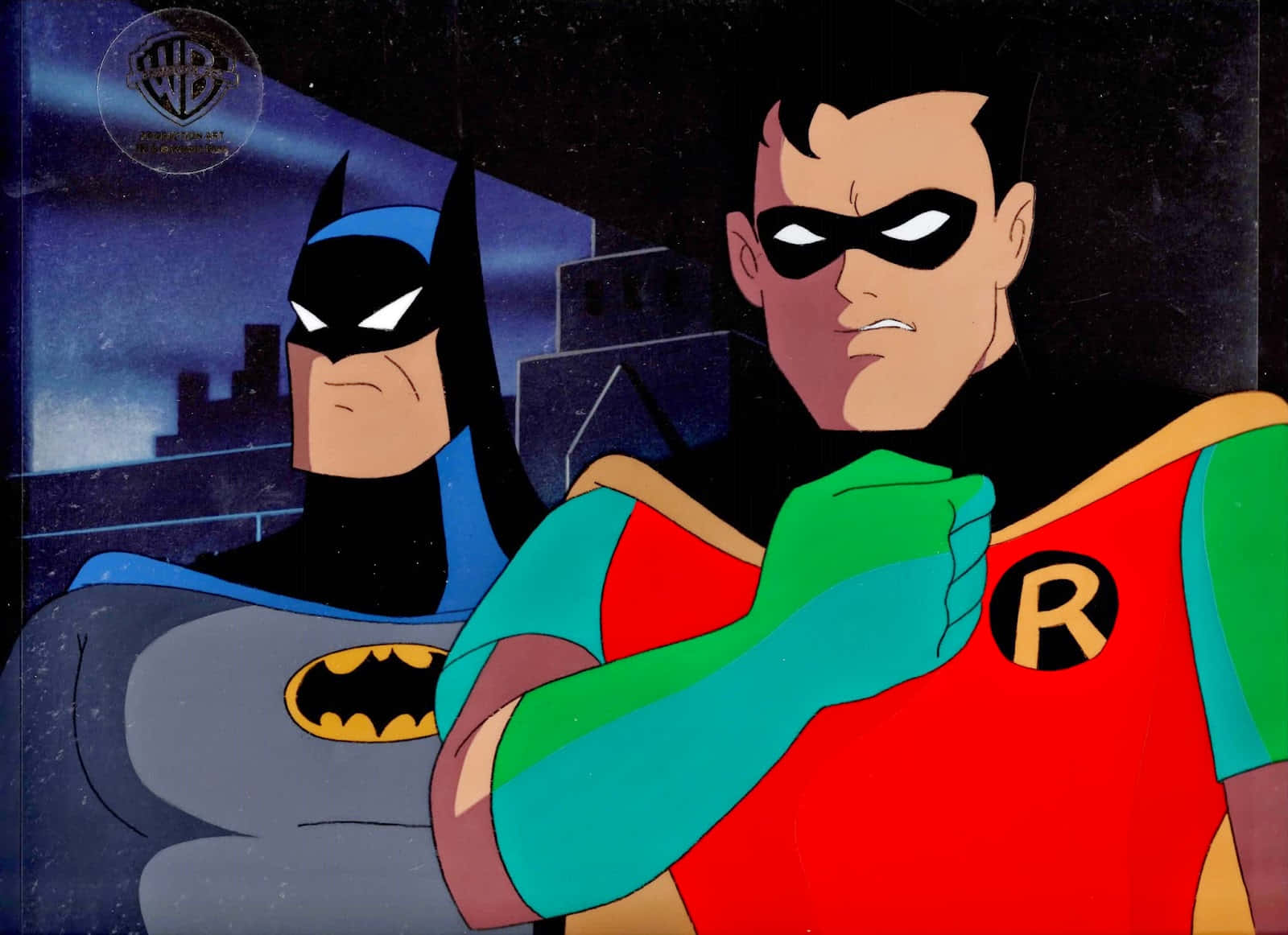 Batman and Robin face off in an epic showdown Wallpaper