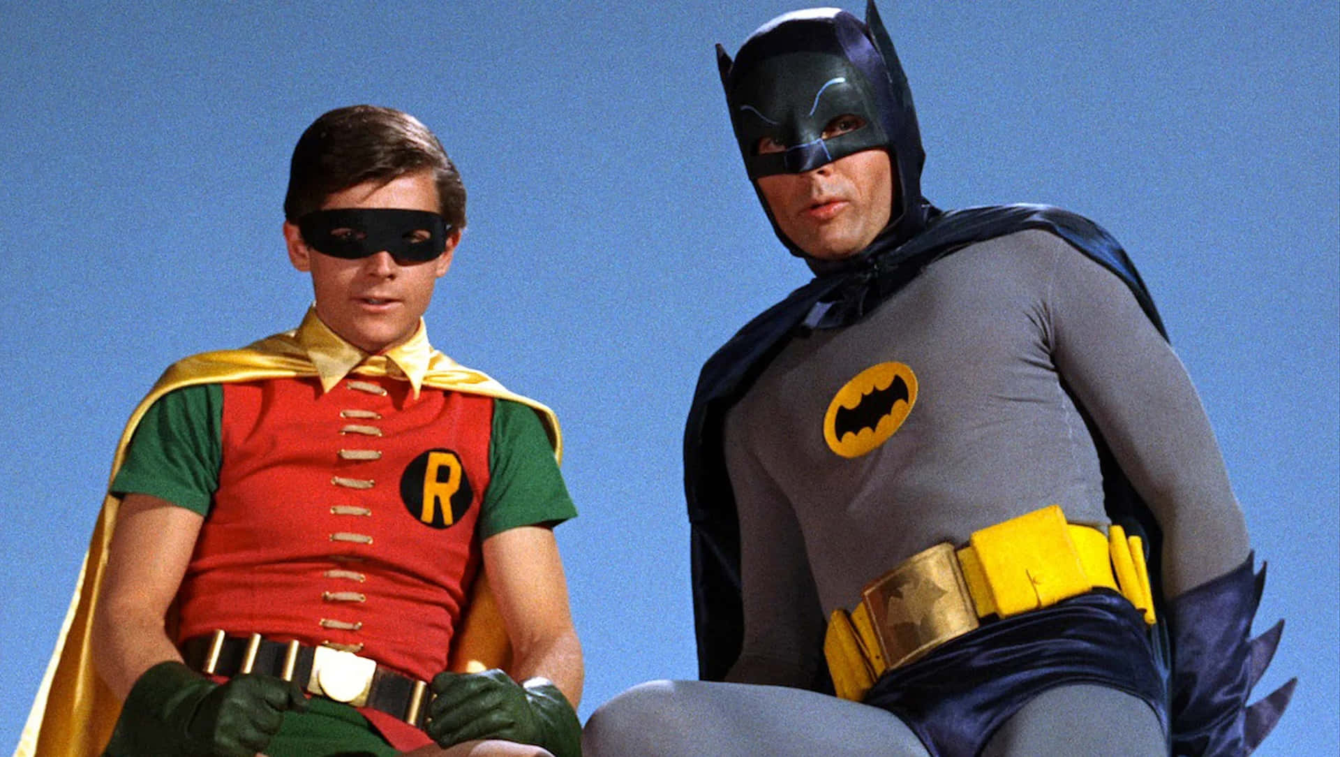 Epische Showdown: Batman Vs Robin Achtergrond