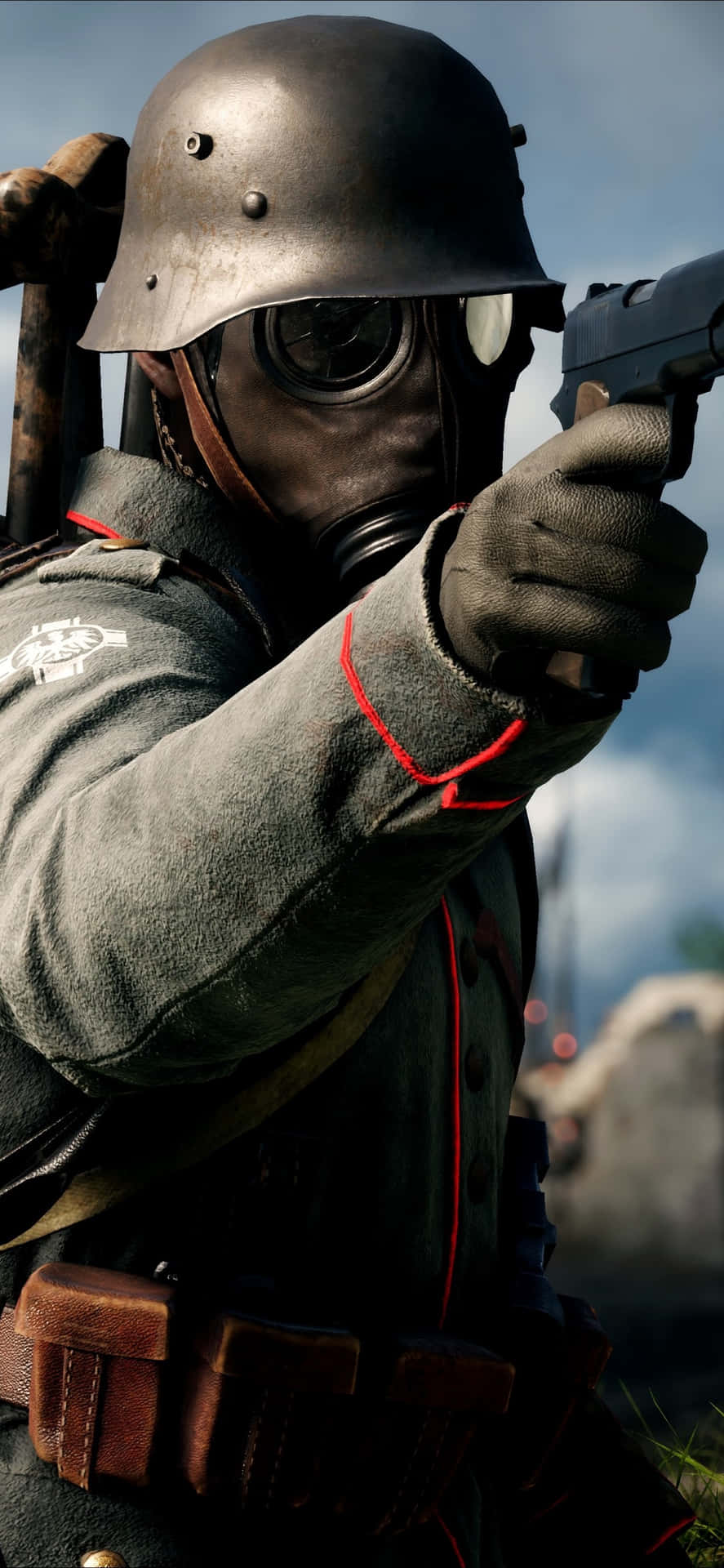 A Soldier Is Holding A Gun In Front Of A Field Wallpaper