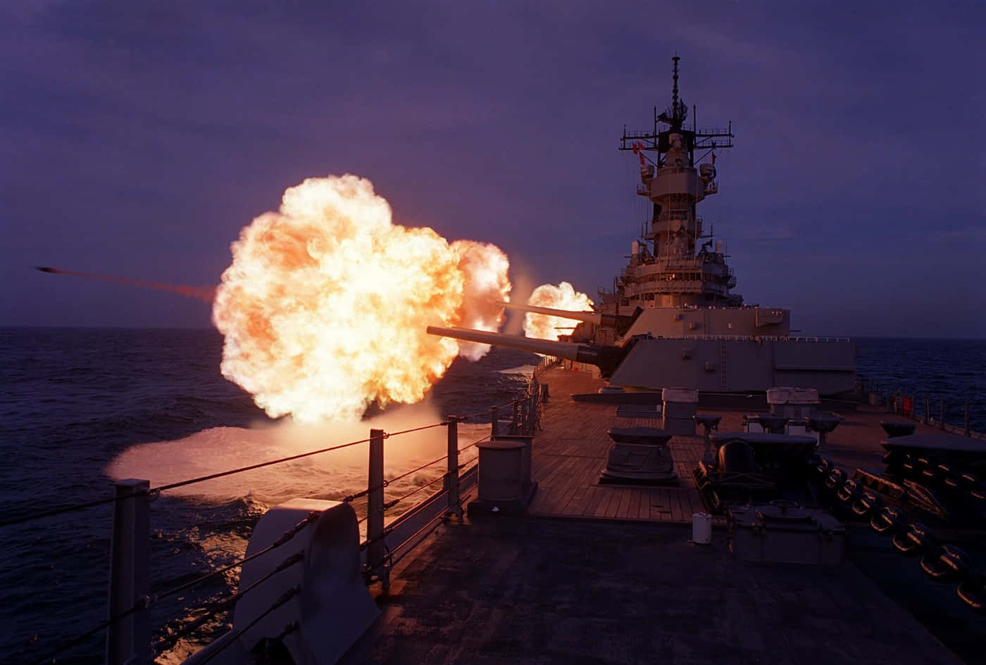 A Battleship With A Fire On The Deck