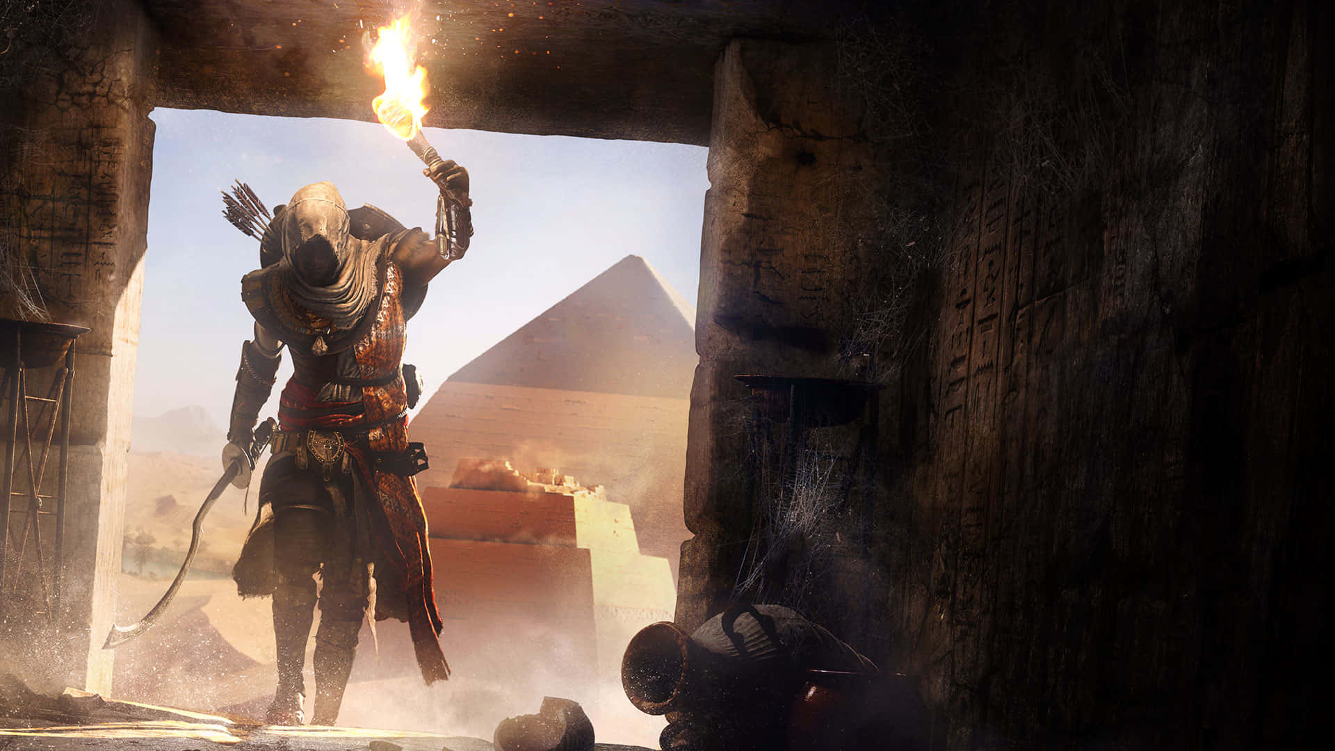 Bayek armed with weapons and ready for combat Wallpaper