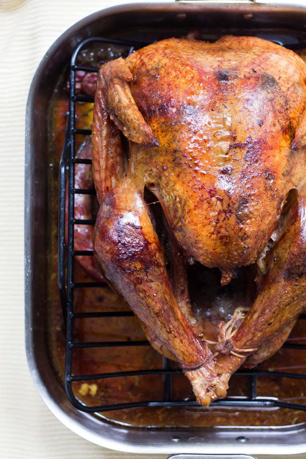A Turkey Is Sitting In A Roasting Pan