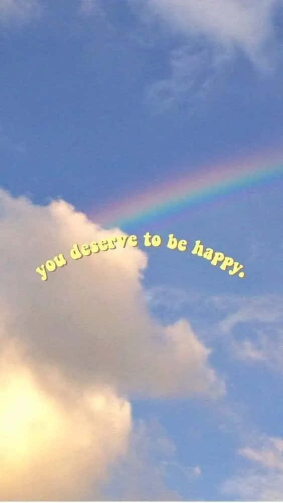 En regnbue med ordene du fortjener at være glad Wallpaper
