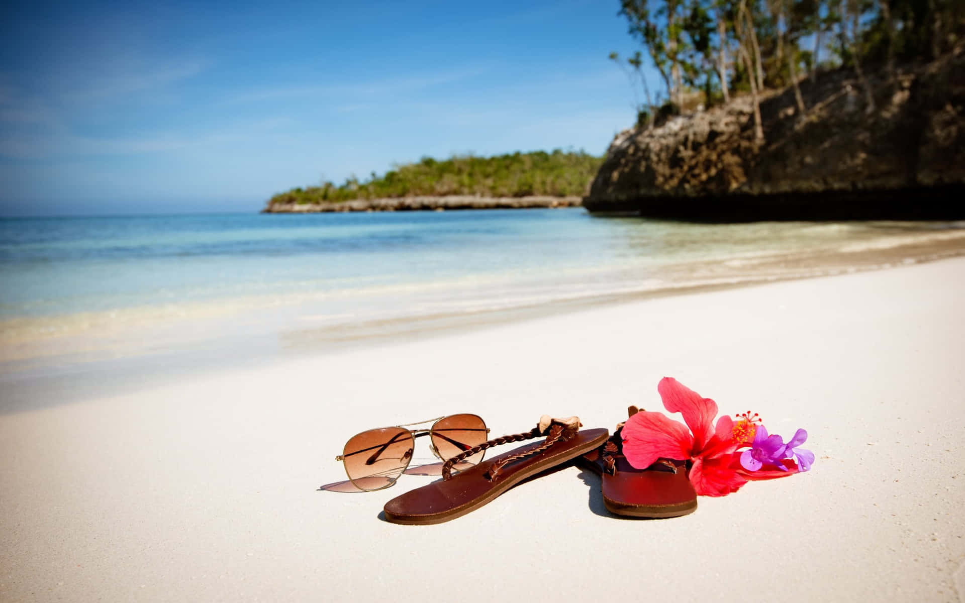 Plezier In De Zon Met Essentiële Strandaccessoires Achtergrond