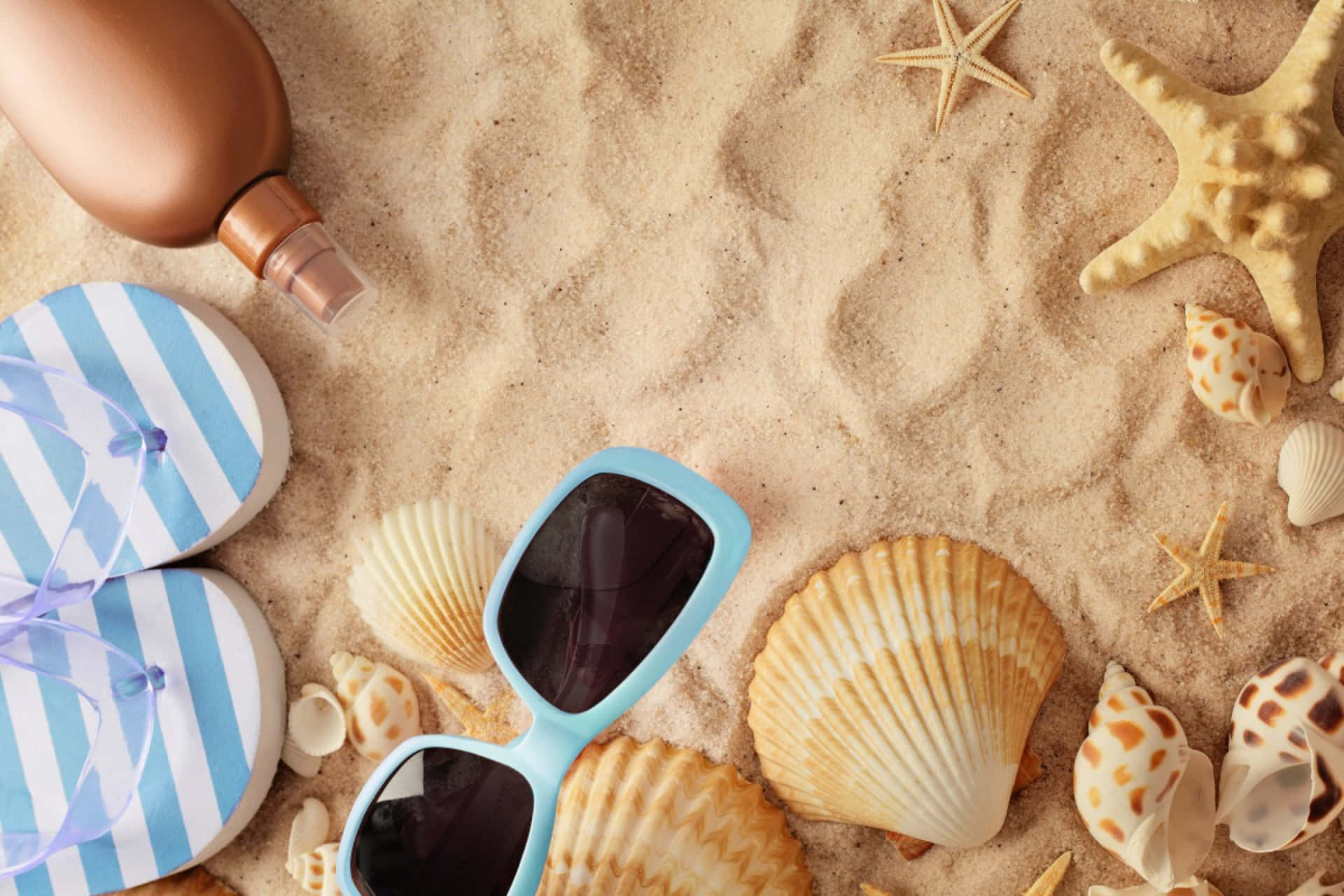 Fun and colorful beach accessories for a perfect day at the shore. Wallpaper