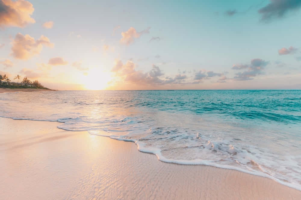 Immaginedi Un Tramonto Estetico Sulla Spiaggia Di Sabbia Bianca
