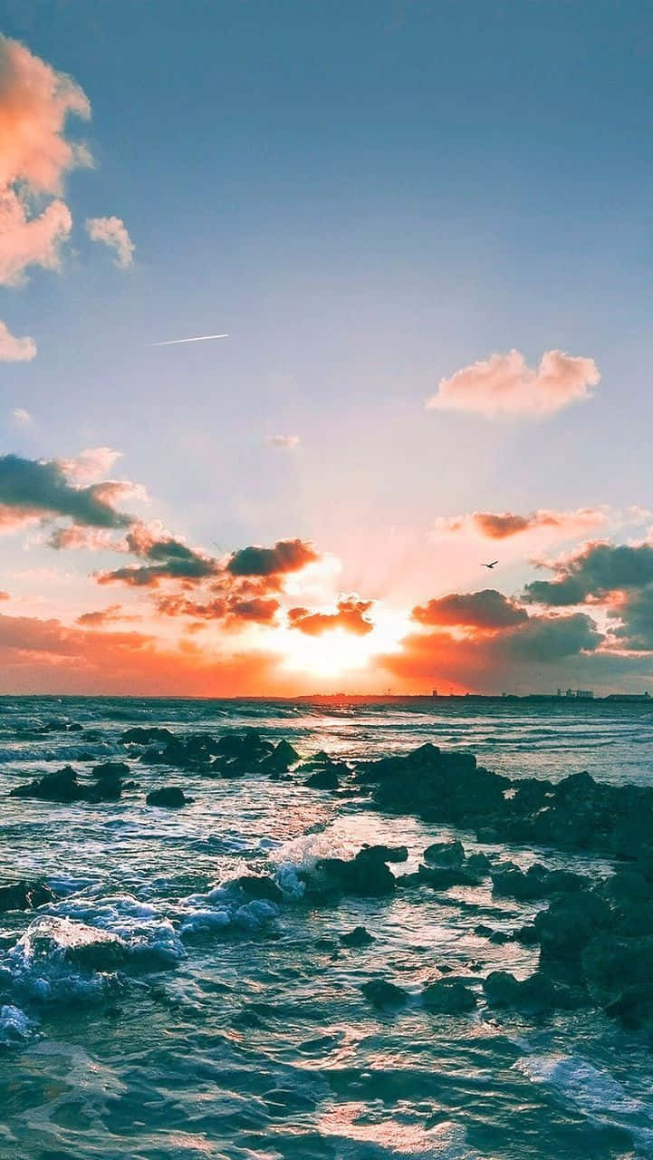 Strandestetiskt Soluppgångsbild