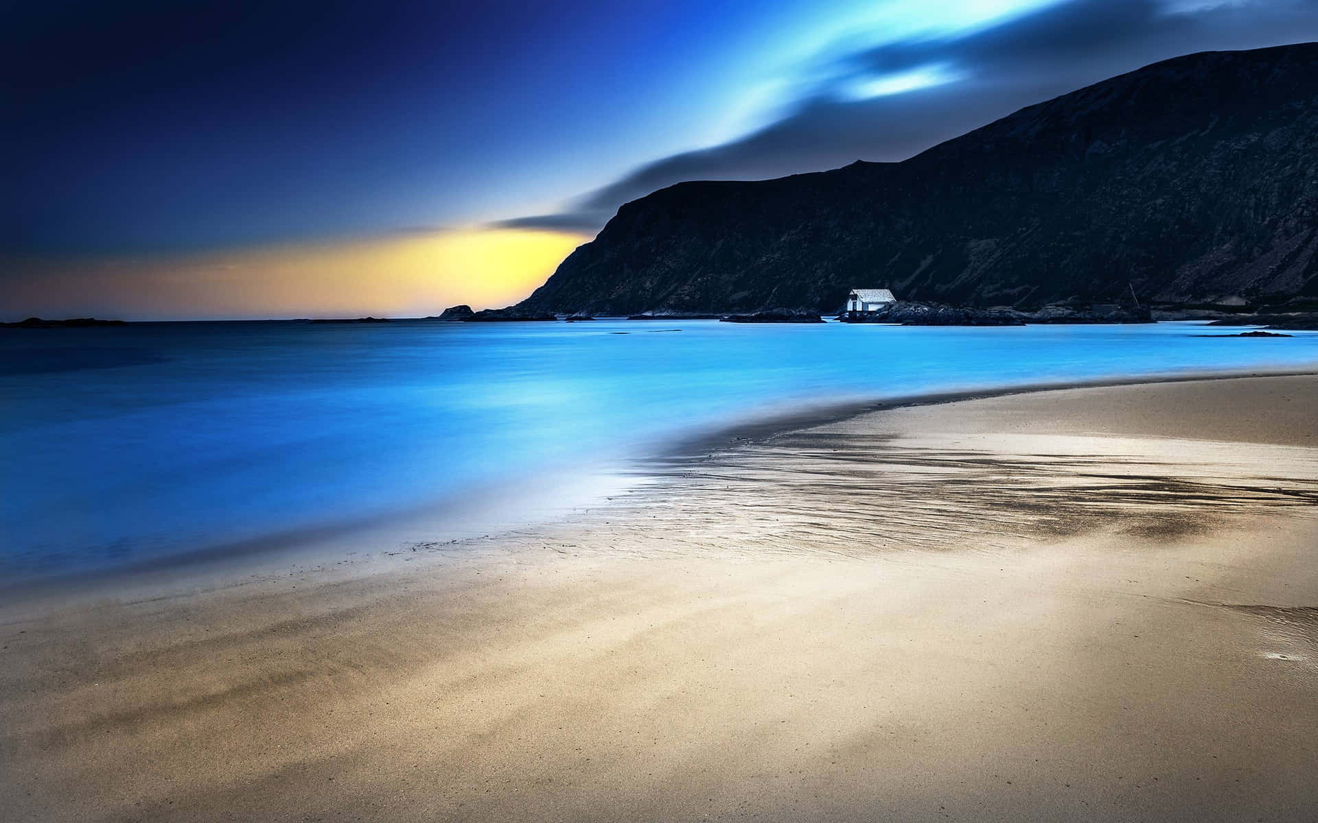 Taking in the peaceful scene of the beach at night