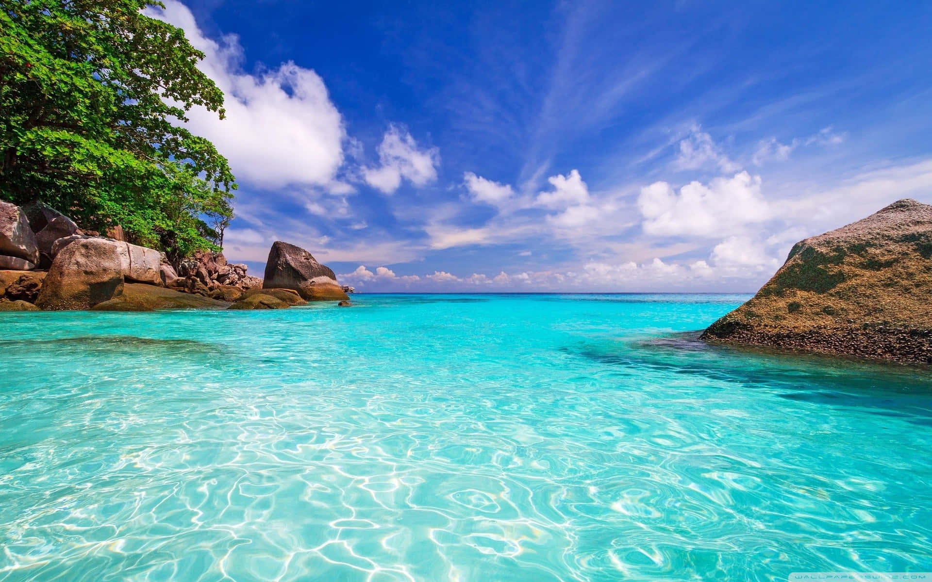 Rocky Crystal Beach Waters Background