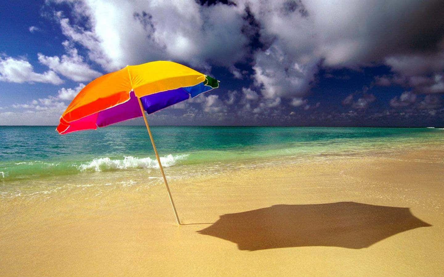 Anchored Colorful Beach Umbrella Background