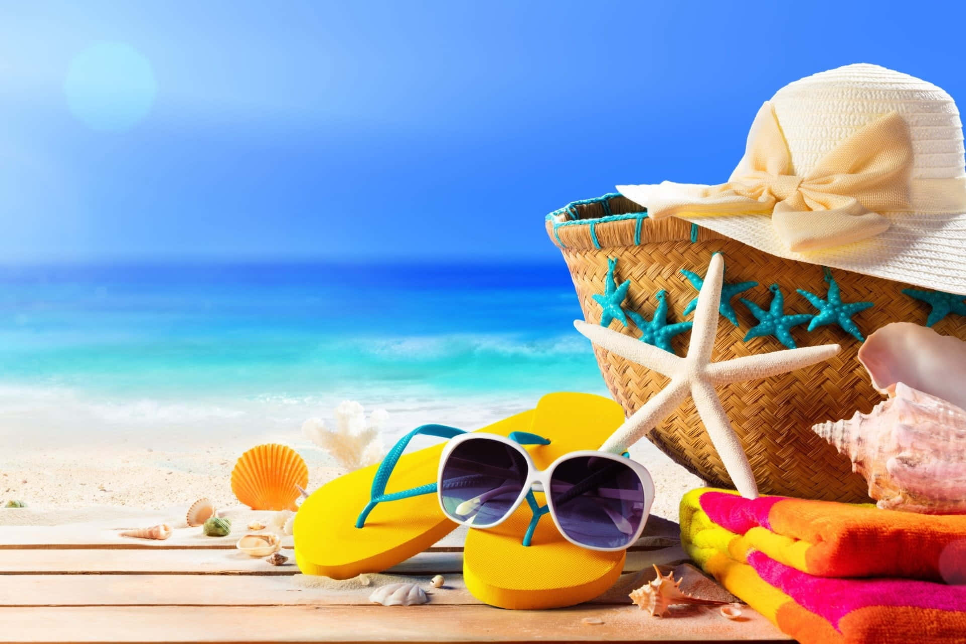 Relaxing Day at the Beach with Essential Beach Bag Wallpaper