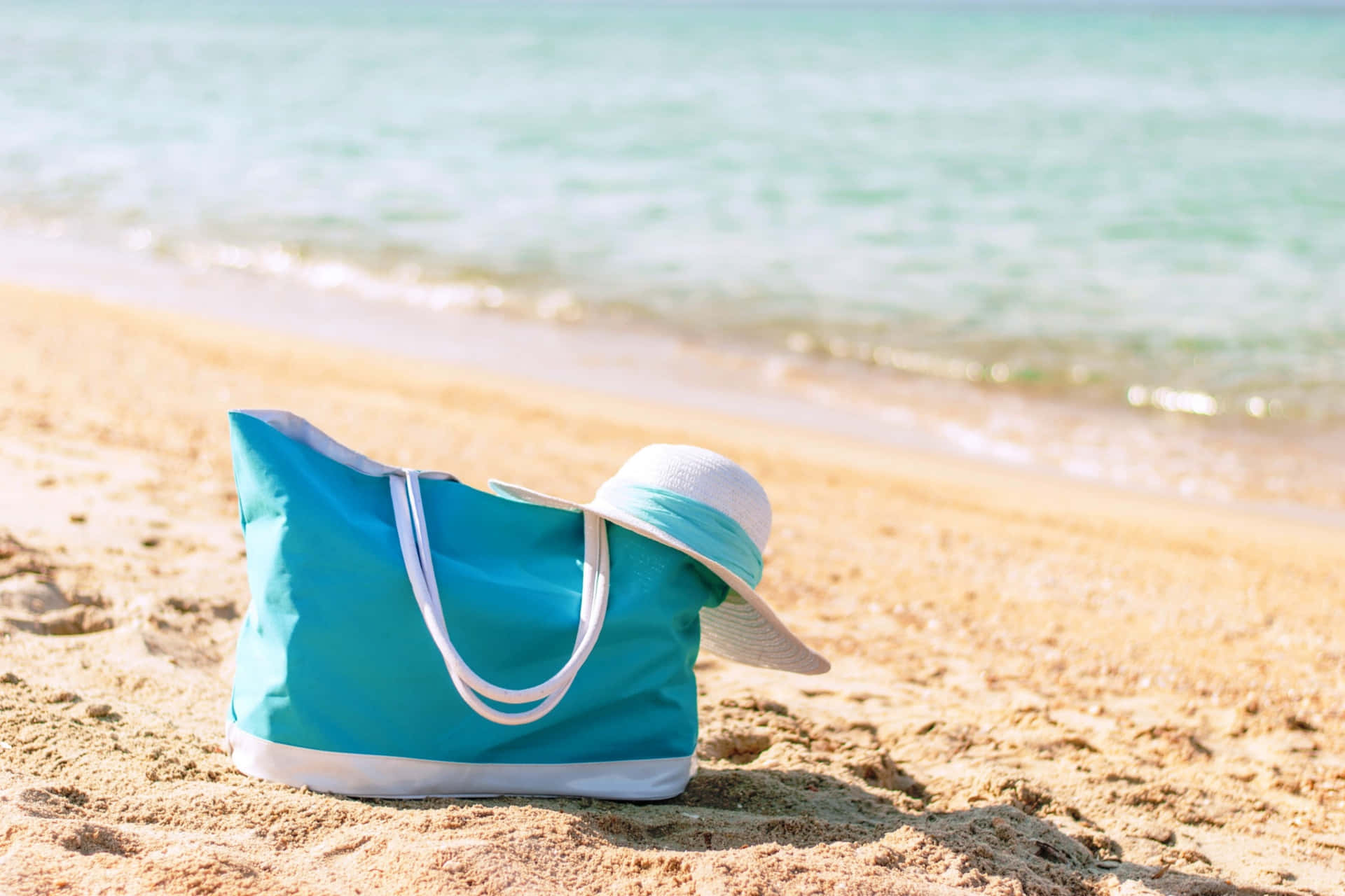 Beach Bag Essentials on Sunny Shore Wallpaper