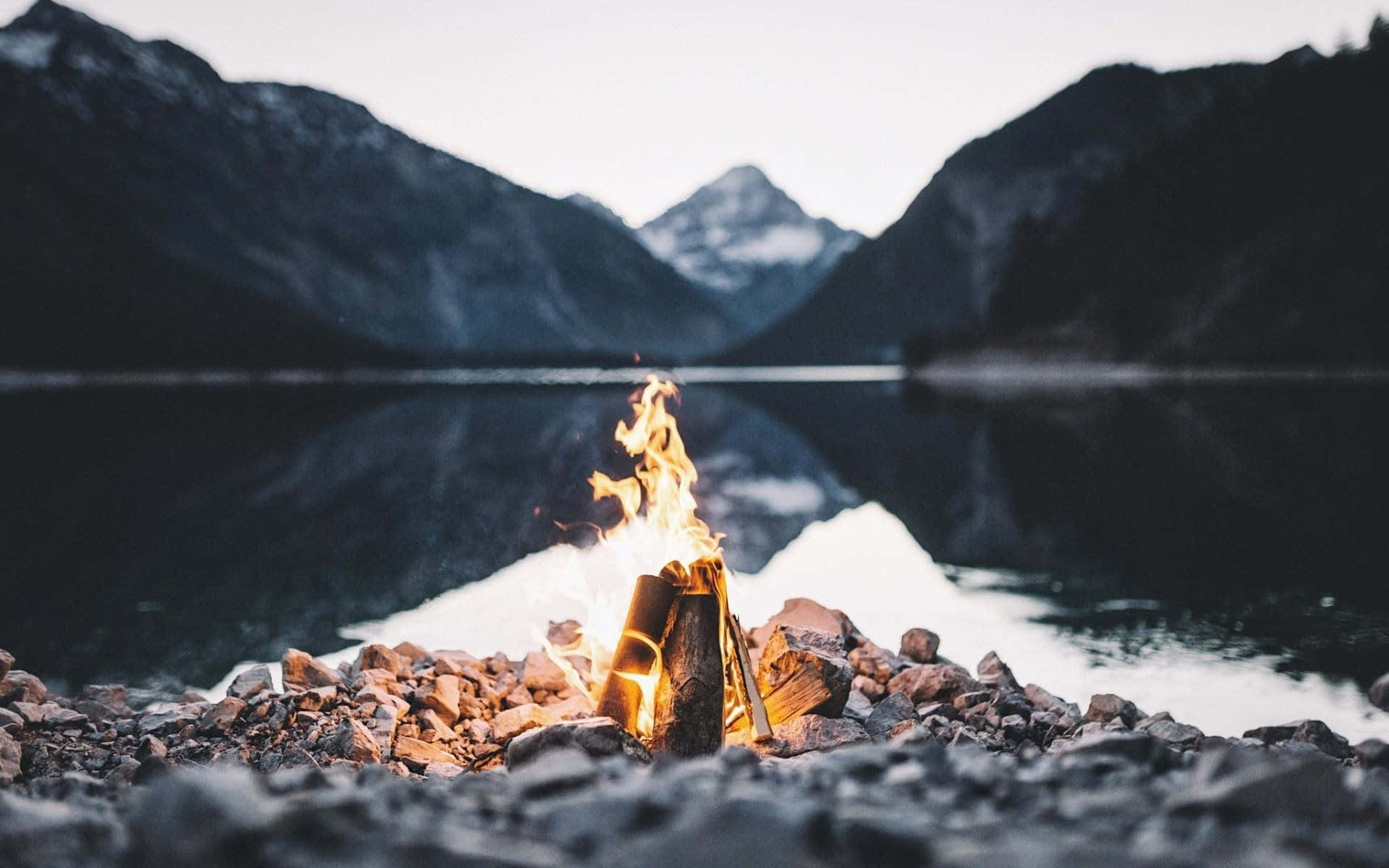 Enchanting Beach Bonfire at Dusk Wallpaper