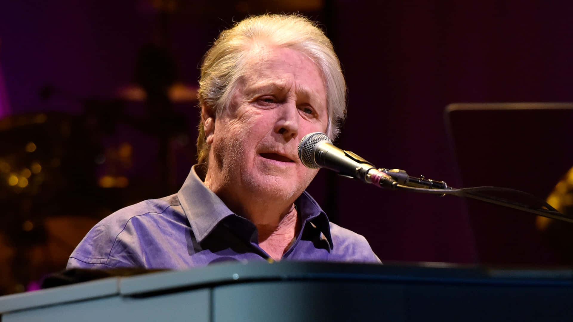Brian Wilson of The Beach Boys Engaging the Crowd at a 2017 Concert Wallpaper